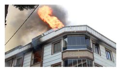 Alev alev yanan binadaki 5 kişi dumandan etkilendi